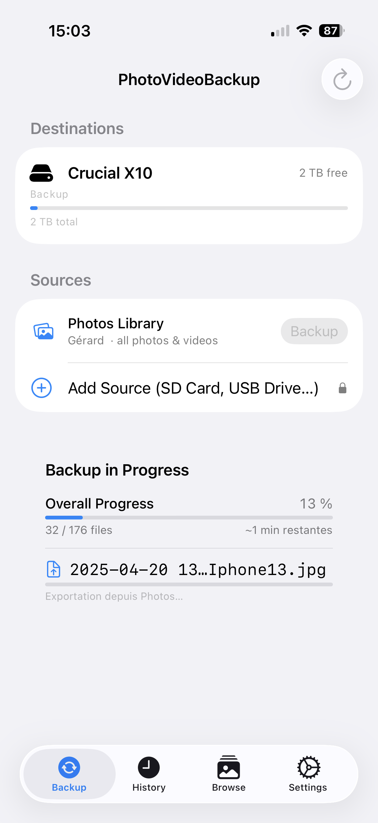 Backup in progress — 13%, exporting from Photos